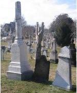Photo of tombstones of David Hall and his three wives.